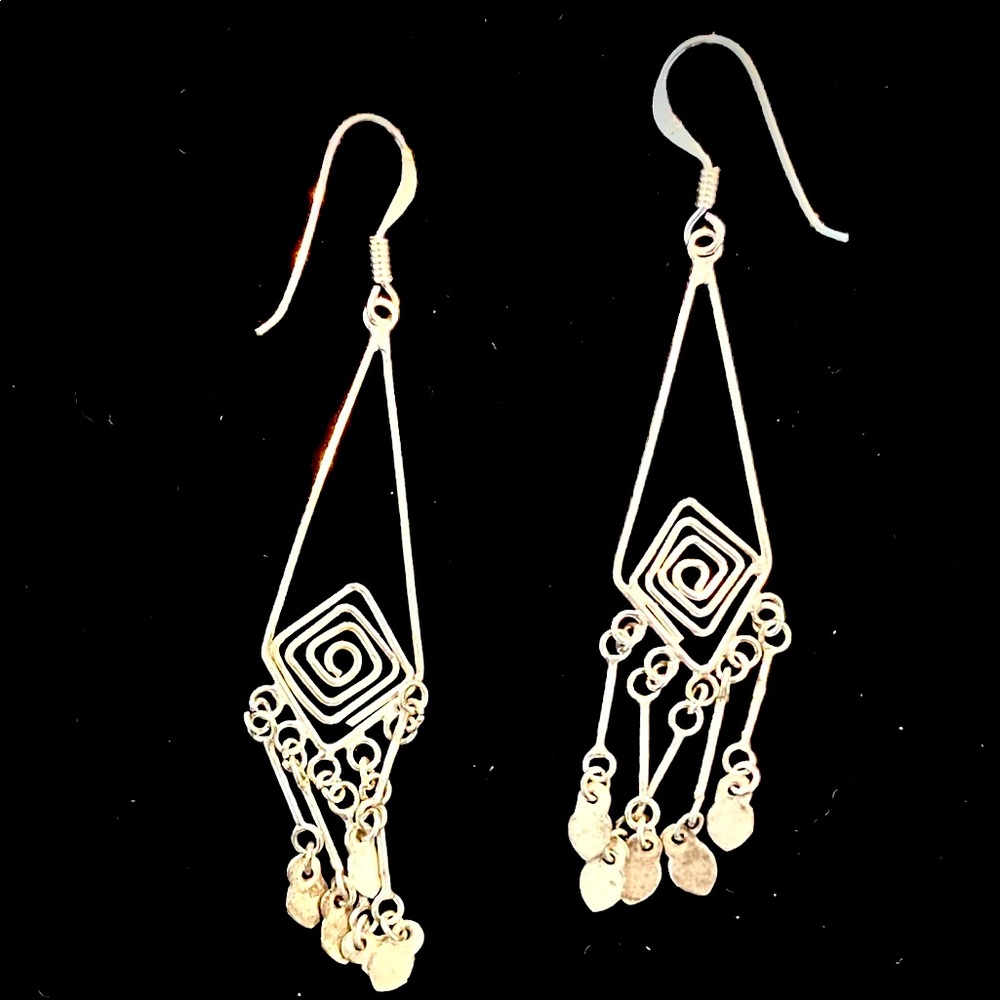 Silver earrings.